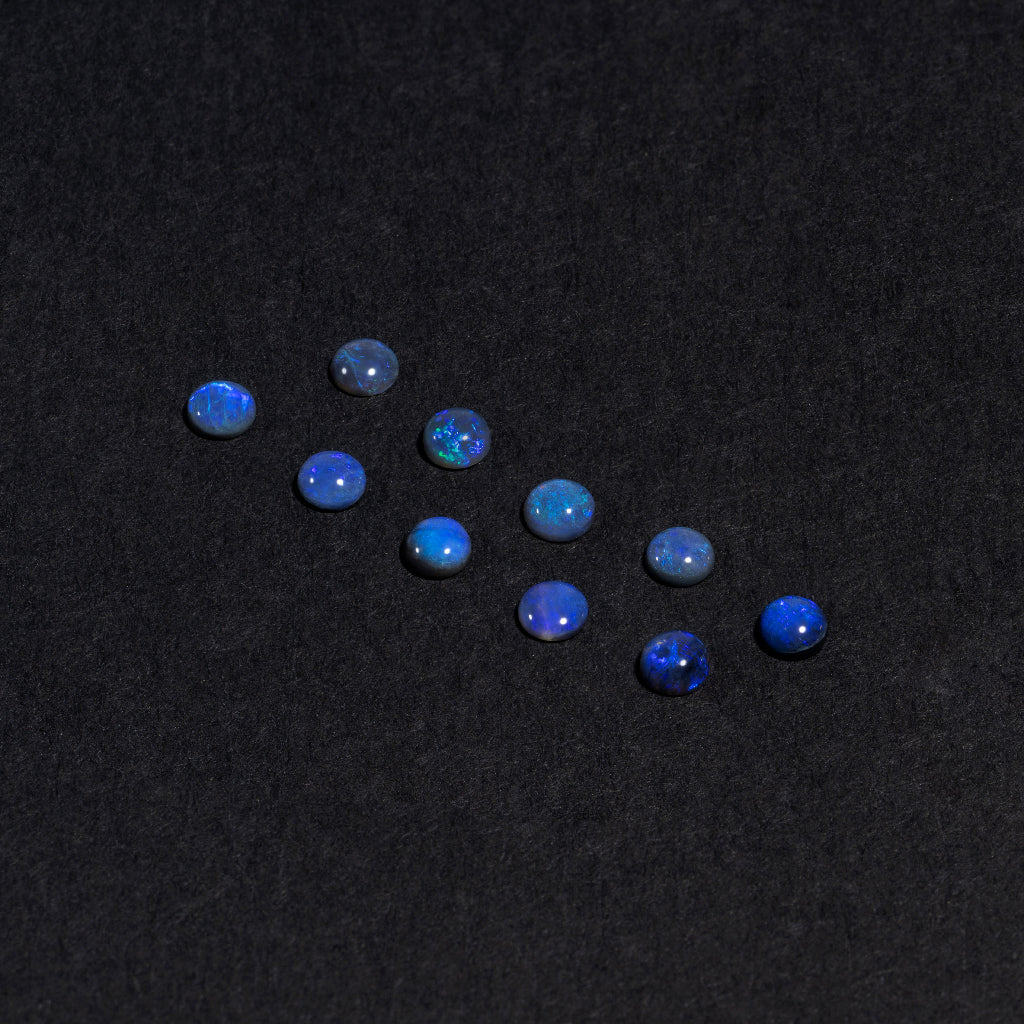 2 to 3.5mm Lightning Ridge Black Opal Round Cabs – Blue/Purple