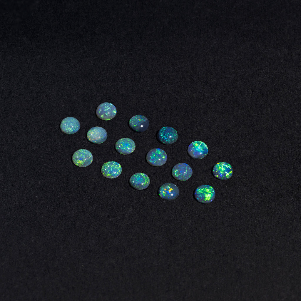 2 to 3.5mm Lightning Ridge Black Opal Round Cabs – Green Play of Color