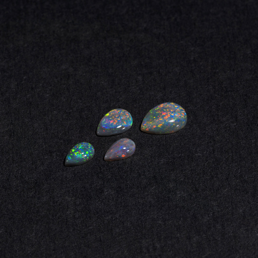 5x3 to 9x7mm Lightning Ridge Black Opal Pears – Full-Spectrum Play of Color