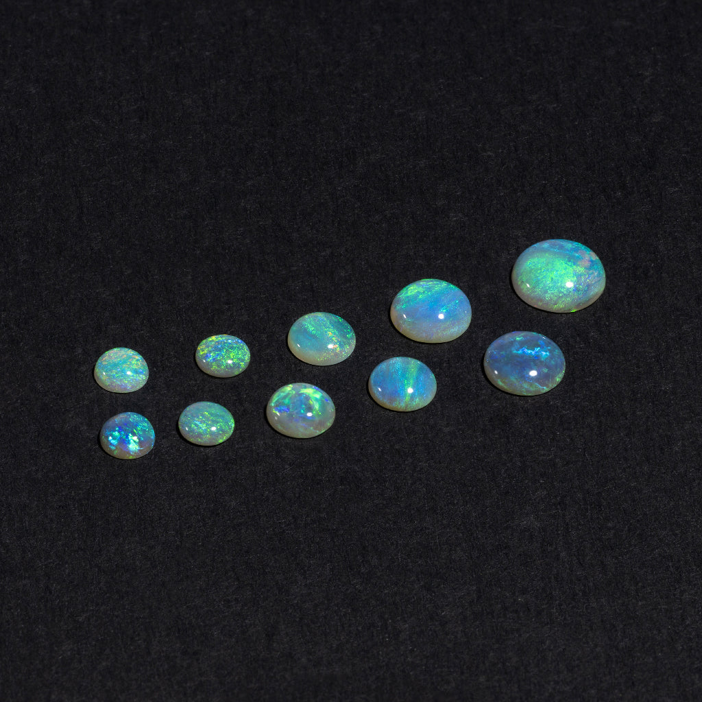 4 to 8mm Lightning Ridge Crystal Opal Round Cabs – Green Play of Color