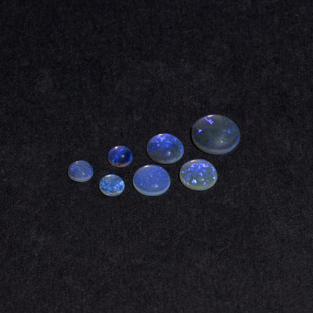 4 to 8mm Lightning Ridge Ghost Opal™ Round Cabs