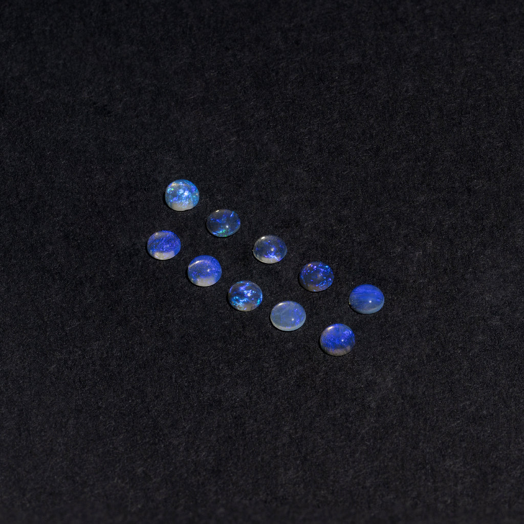 2 to 3.5mm Lightning Ridge Ghost Opal™ Round Cabs