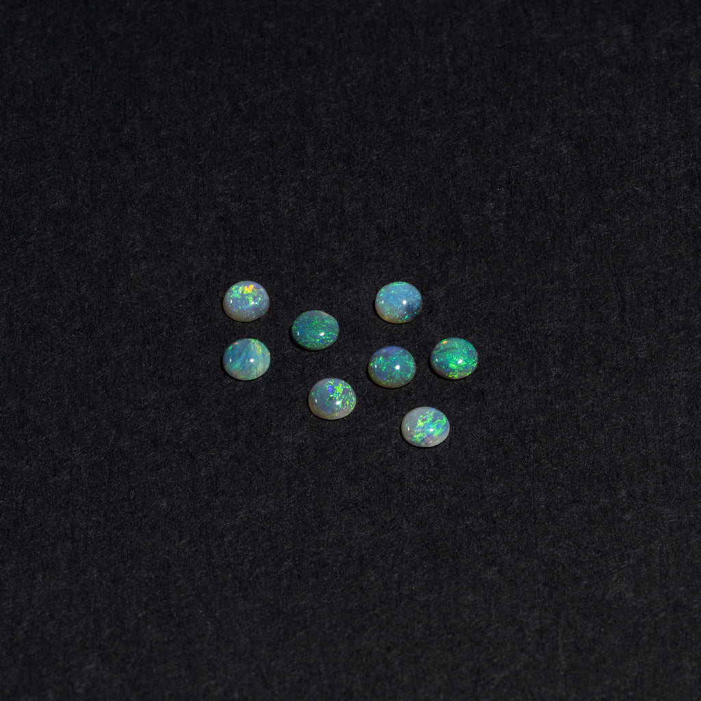2 to 3.5mm Lightning Ridge Semi-Black Opal Round Cabs – Green Play of Color