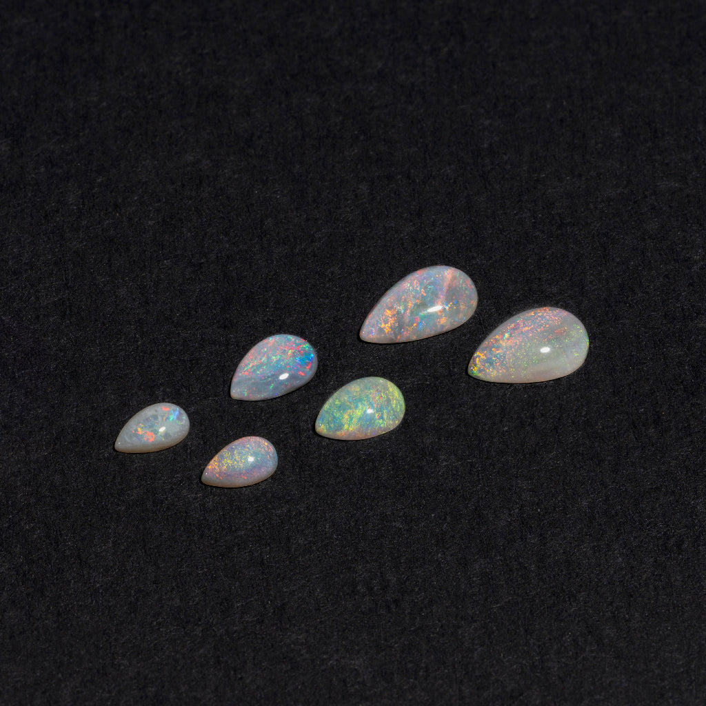 5x3 to 9x7mm Lightning Ridge White Opal Pears – Orange Play of Color
