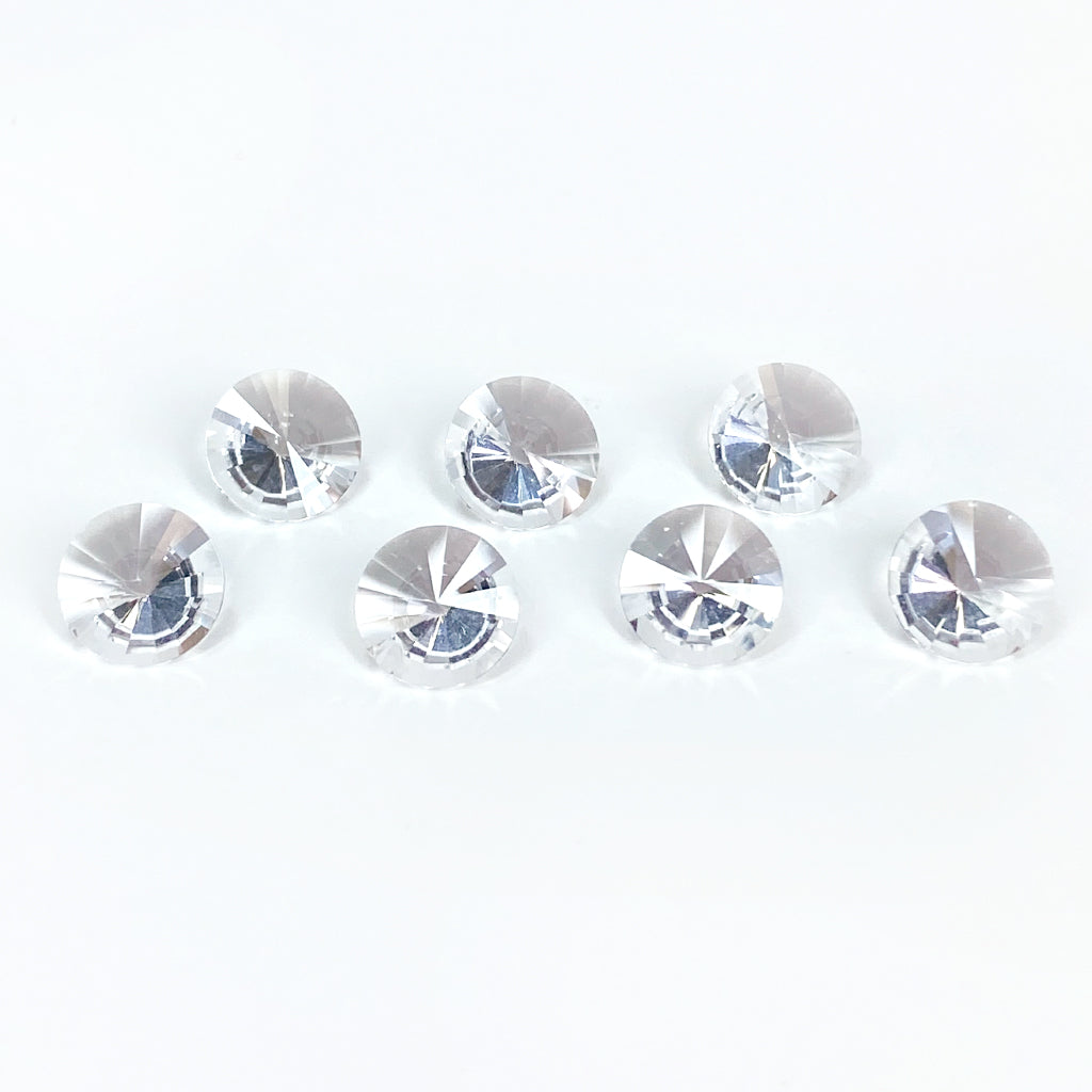 6 to 8mm Arkansas Clear Quartz Round Flute Cuts™
