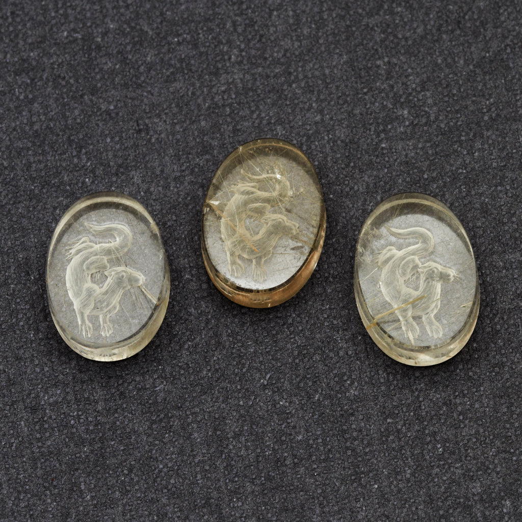 14x10mm Rutilated Quartz Oval Otter Intaglio Carvings