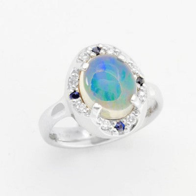 10x8mm Play of Color Cabachon Mexican Opal Ring in 14kt White Gold