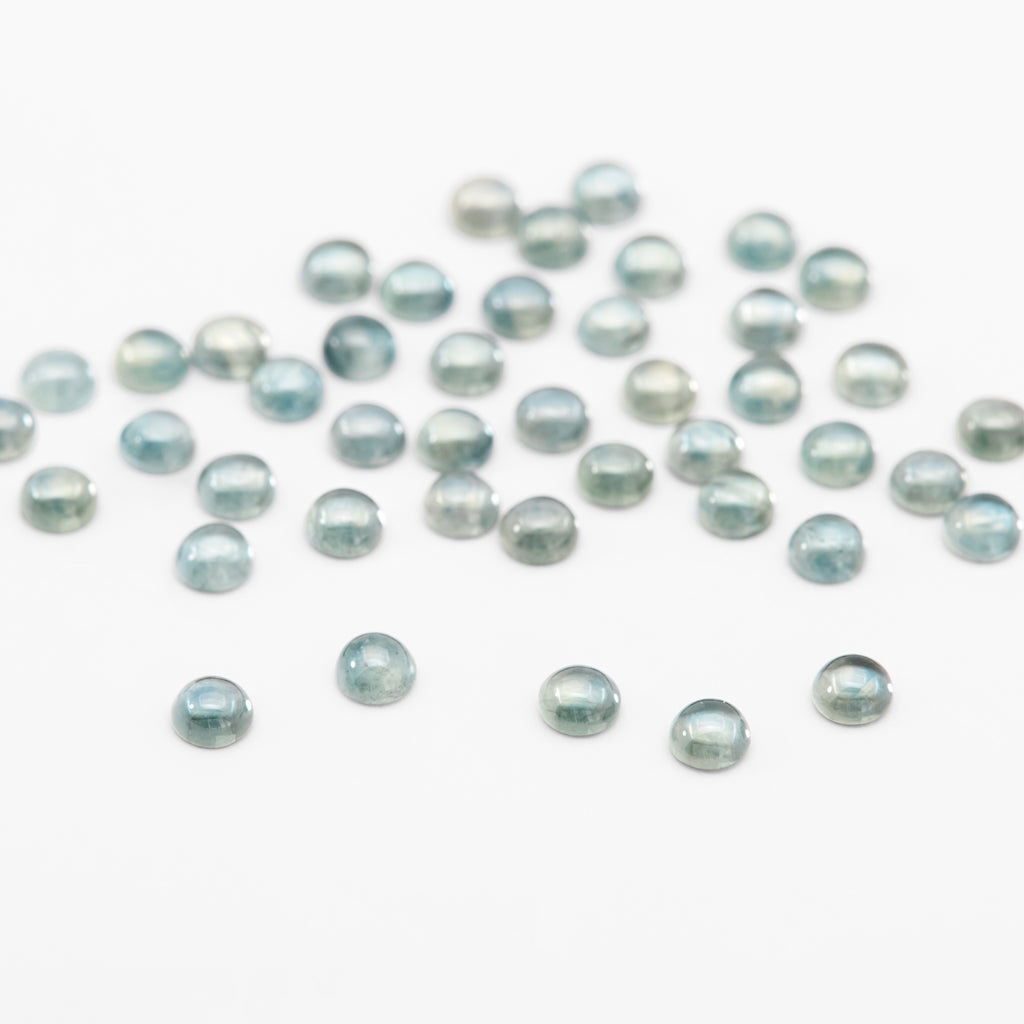 2.5 to 3.5mm Medium Teal Montana Sapphire Round Cabs