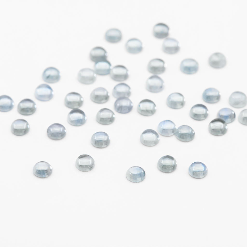 2.5 to 3mm Light Denim Montana Sapphire Round Cabs