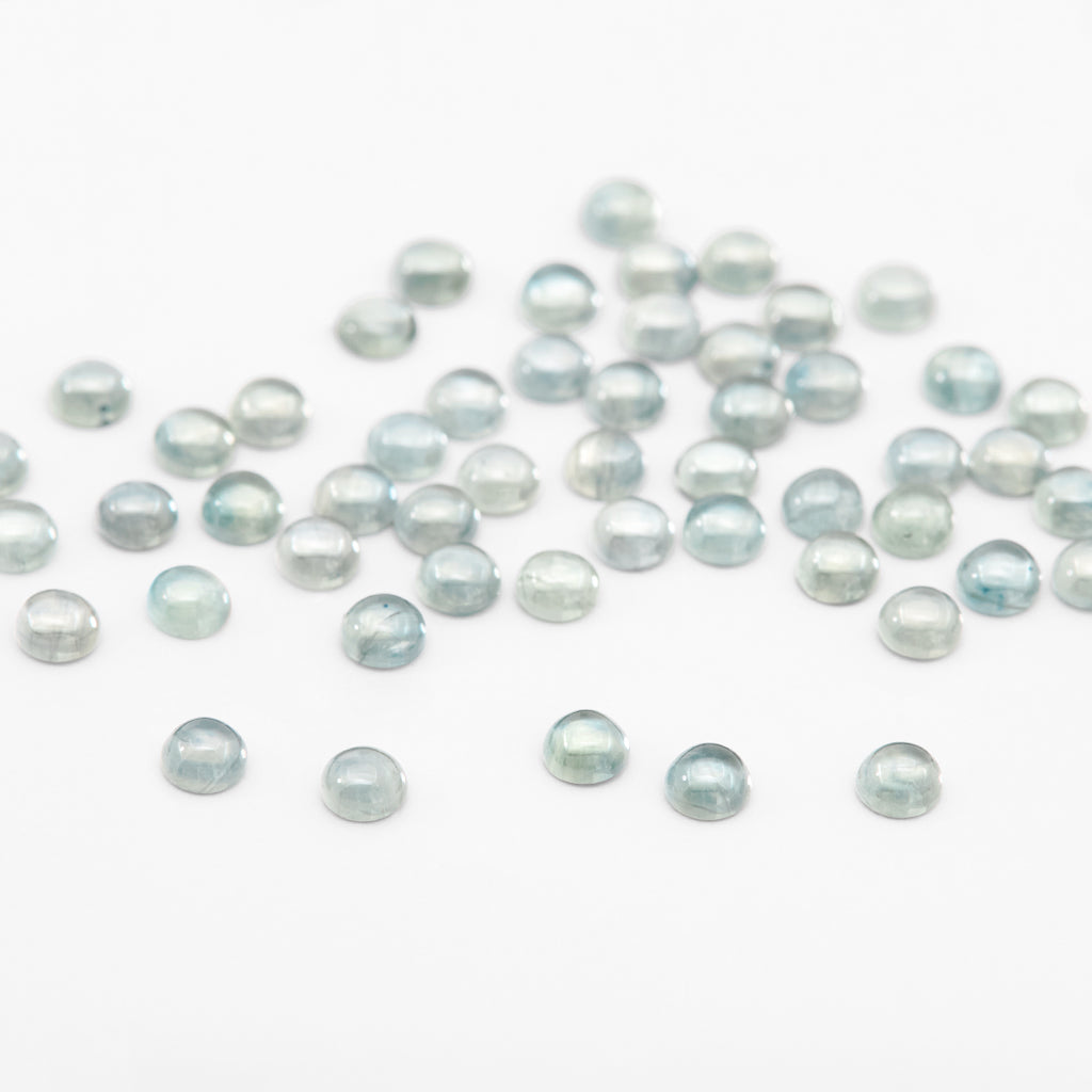 2.5 to 3.5mm Light Teal Montana Sapphire Round Cabs