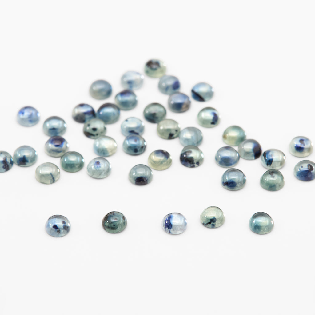 2.5 to 3.5mm Bi-Color Montana Sapphire Round Cabs