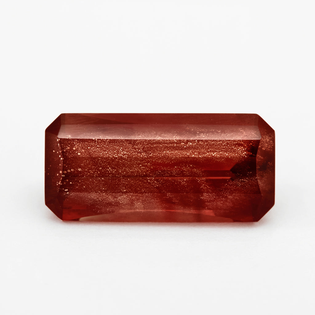 5.60 Deep Red Oregon Sunstone Roll Top Emerald Cut