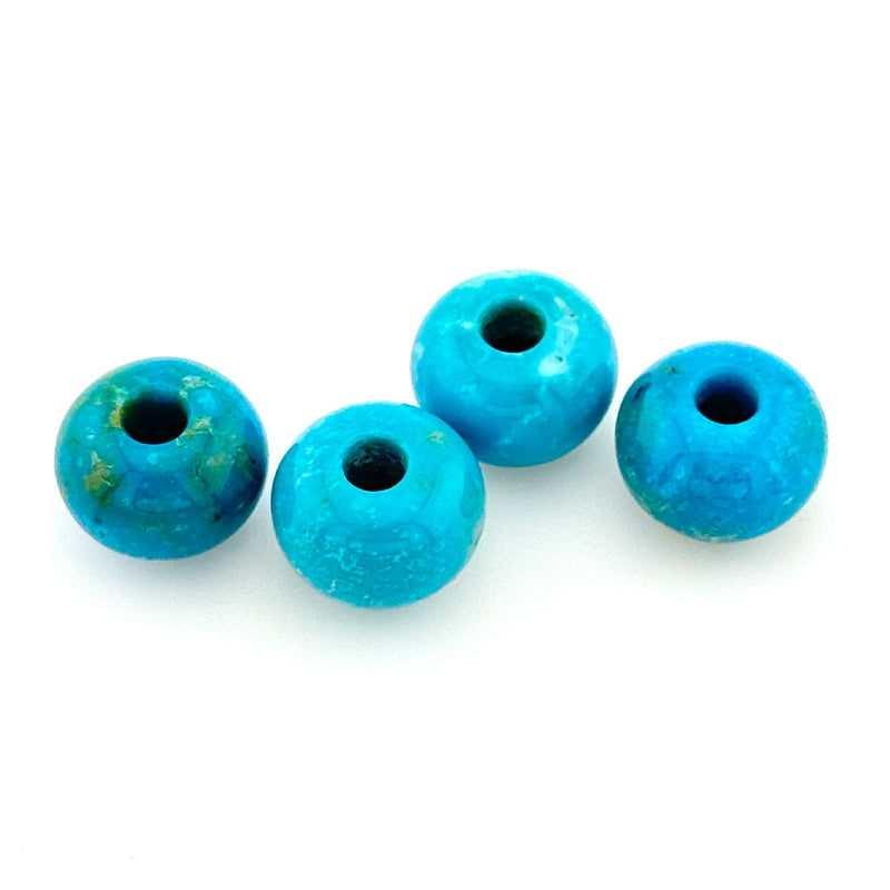 8.5x6 to 10.5x7.5mm Arizona Stabilized Turquoise Wheel Beads