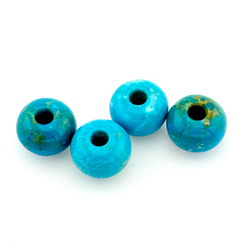 8.5x6 to 10.5x7.5mm Arizona Stabilized Turquoise Wheel Beads