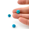 8.5x6 to 10.5x7.5mm Arizona Stabilized Turquoise Wheel Beads