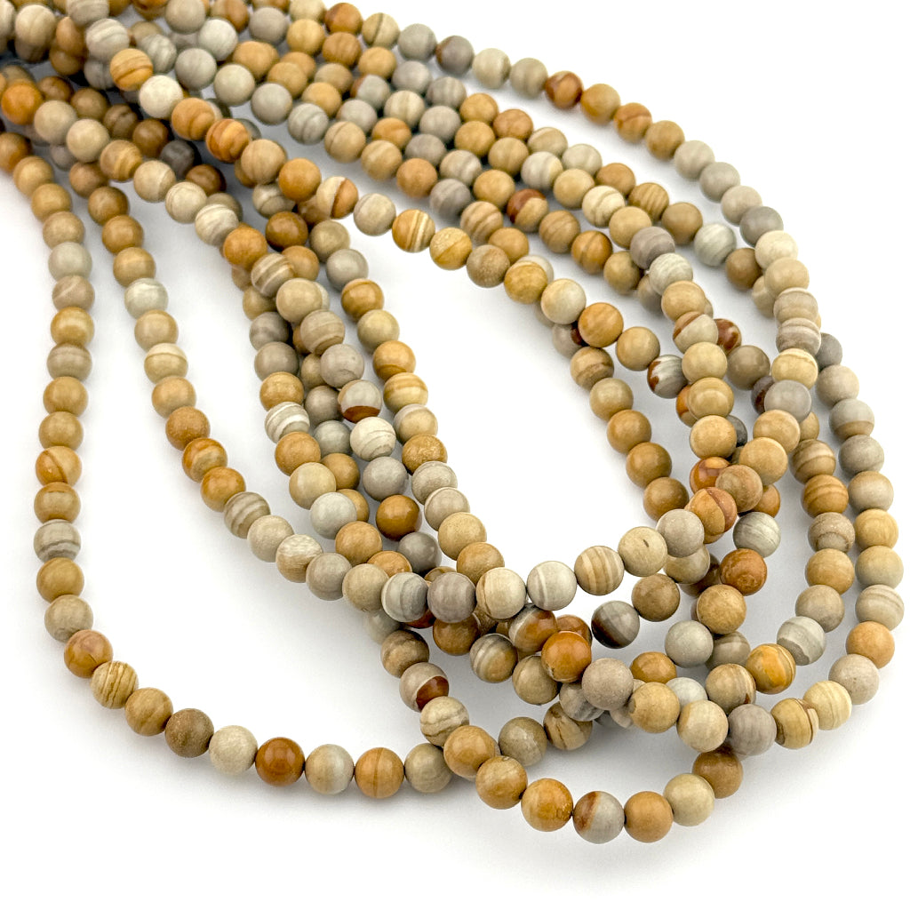6 to 8mm Owyhee Golden Sunset Jasper Round Bead Strands