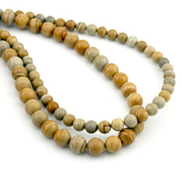 6 to 8mm Owyhee Golden Sunset Jasper Round Bead Strands