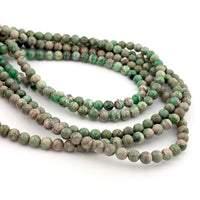 6 to 8mm Utah Veriscite Round Bead Strands