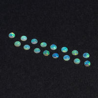 1.5 to 3.5mm Lightning Ridge Crystal Opal Round Cabs – Green Play of Color
