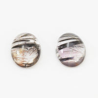 7x5 to 16x12mm Hematite in Quartz Oval Cabs