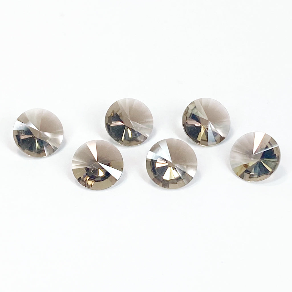 6 to 8mm Arkansas Smoky Quartz Round Flute Cuts™