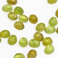 Parcel of Ten 10x8mm Mesa Verde® Peridot Carved Scarab Oval Cabs