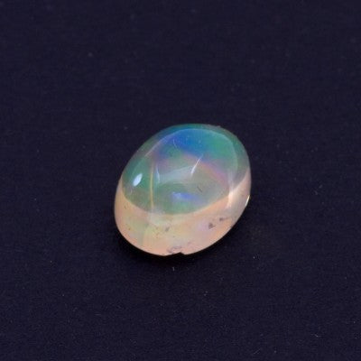 9.7x7.3mm Oval Play of Color Cabochon Cut Mexican Fire Opal 