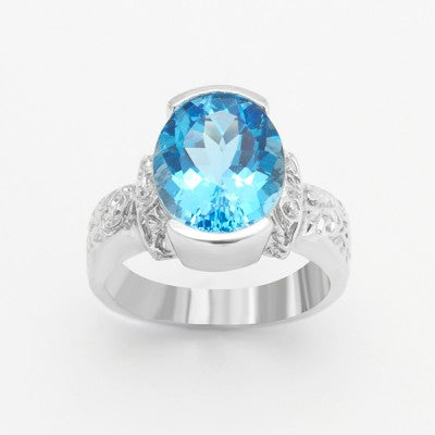12x10mm Oval Blue Topaz Half Bezel Filigree Ring in Sterling Silver